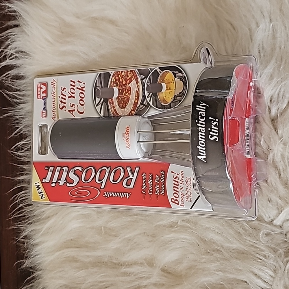 New in package RoboStir  Automatically Stirs As You Cook -3 Speeds As seen on TV